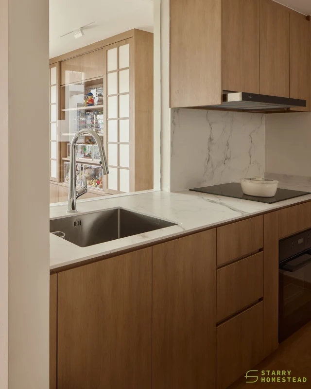 The kitchen and service yard complement each other beautifully, making even a small space fully functional.
-
Bellewaters // Japandi
Designer: Roy & Steven
-
#starryhomestead #singapore #renovation #interiordesign #qanvast #homematch #hometrust #sghomedecor #interiordesigninspo #sgreno #sgid #sghome #hdb #bto #condo #landed #commercial #modern #japandi #wabisabi #kitchen #cabinet #storage