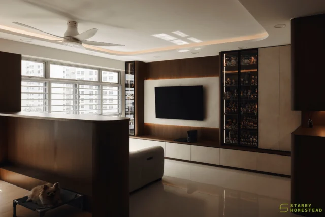 The space feels airy and expansive. By bringing together a bar counter, study and living areas, it accommodates different daily moments while maintaining a light, open and breathable flow.
-
Acacia Breeze @ Yishun // Modern Contemporary 
Designer: Si Ming
-
#starryhomestead #singapore #renovation #interiordesign #qanvast #homematch #hometrust #sghomedecor #interiordesigninspo #sgreno #sgid #sghome #hdb #bto #condo #landed #commercial #modern #comtemporary #luxury #livingroom #workingarea