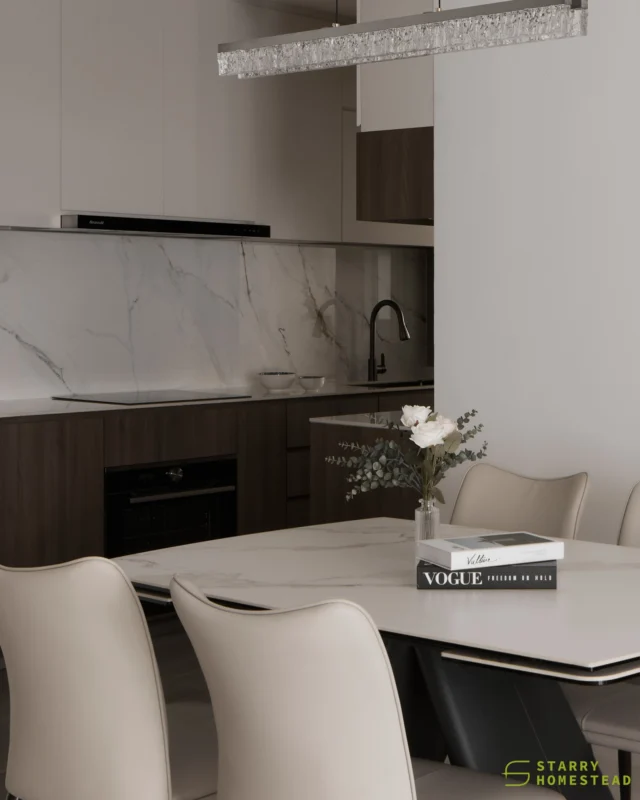A glass-finished pendant light in the dining area introduces a refined sense of transparency, gently elevating the ambience with its subtle play of light, while in the kitchen, a marble-effect worktop paired with dark wood cabinetry creates a harmonious balance between deeper tones and lighter elements.
-
Dakota One // Modern Contemporary 
Designer: Hailey
-
#starryhomestead #singapore #renovation #interiordesign #qanvast #homematch #hometrust #homedecor #interiors #interiorinspo #interiordesigninspo #renovationinspo #sginteriordesign #sgrenovation #interior #design #singaporehomes #sghome #hdb #bto #condo #landed #commercial #modern #comtemporary #luxury #diningarea #kitchen #kitchendesign #kitchenremodelideas