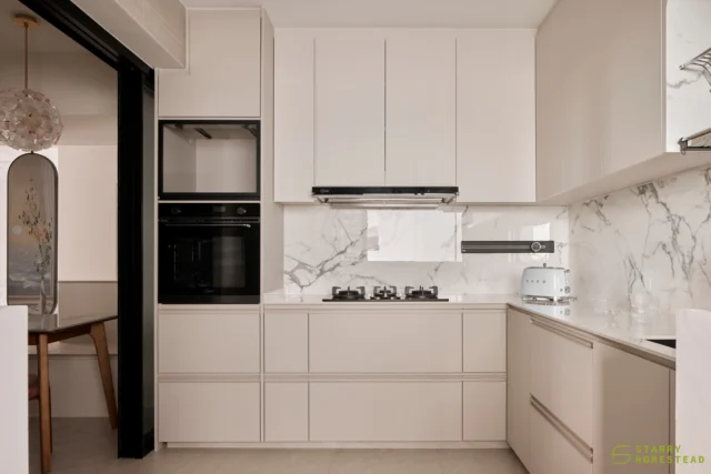 White paired with marble and handleless cabinet doors speaks a clean and seamless design language, while conveying a subtle sense of soft luxury.
-
Bishan Towers // Creamy French
Designer: Zheng Sheng
-
#starryhomestead #singapore #renovation #interiordesign #qanvast #homematch #hometrust #sghomedecor #interiordesigninspo #sgreno #sgid #sghome #hdb #bto #condo #landed #commercial #modern #creamy #french #diningarea #kitchen