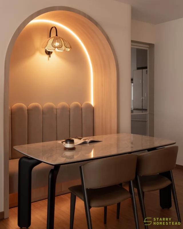 More than just a living room, the space divided into two areas — living and dining.

The dining area features an arched seating design, with a velvet backrest that carries the same soft, cosy vibe throughout the space.

Set beside the kitchen, it embraces a style that is simple, practical, and well organised, everything a perfect kitchen should be.
-
Yishun Ave 6 // Modern Scandinavian
Designer: Nixon
-
#starryhomestead #singapore #renovation #interiordesign #qanvast #homematch #hometrust #sghomedecor #interiordesigninspo #sgreno #sgid #sghome #hdb #bto #condo #landed #commercial #modern #comtemporary #scandinavian #dining #kitchen