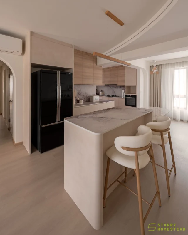 A kitchen that is warm, functional, and thoughtfully designed. Soft wood tones are paired with marble-effect surfaces, while under-cabinet lighting casts a gentle glow across the workspace. Designed for both everyday cooking and meaningful moments, the space brings together practicality with effortless elegance.
-
Punggol Emerald // Japandi
Designer: Darren
-
#starryhomestead #singapore #renovation #interiordesign #qanvast #homematch #hometrust #homedecor #interiors #interiorinspo #interiordesigninspo #renovationinspo #sginteriordesign #sgrenovation #interior #design #singaporehomes #sghome #hdb #bto #condo #modern #creamy #japandi #diningarea #kitchen #openkitchen