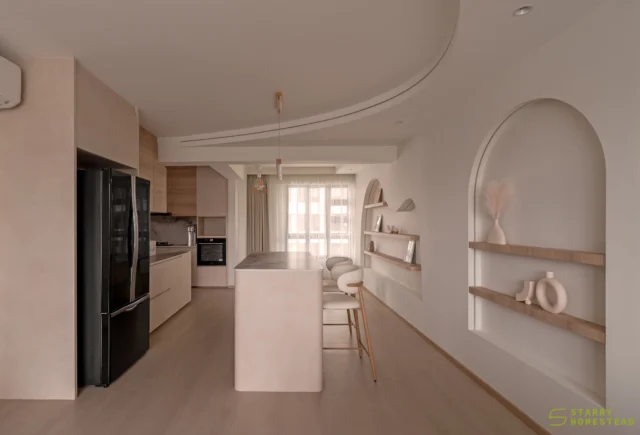 The open-concept kitchen and dining area flow effortlessly beneath a softly curved ceiling, creating a gentle sense of movement throughout the space. Warm wood tones, subtle curves, and abundant natural light combine to form an interior that feels bright, calming, and effortlessly welcoming.
-
Punggol Emerald // Japandi
Designer: Darren
-
#starryhomestead #singapore #renovation #interiordesign #qanvast #homematch #hometrust #homedecor #interiors #interiorinspo #interiordesigninspo #renovationinspo #sginteriordesign #sgrenovation #interior #design #singaporehomes #sghome #hdb #bto #condo #modern #creamy #japandi #kitchen #openkitchen