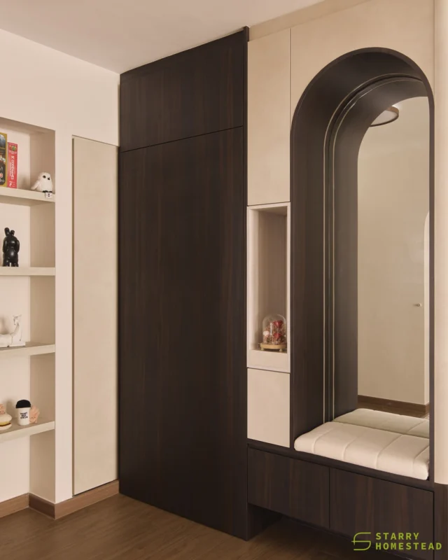 The entrance is the first impression of every home, making both aesthetics and functionality equally important. A  warm neutral palette immediately draws the eye, while the combination of storage, display niche, a mirror, and curved detail create a welcoming entrance that's both stylish and practical.
-
Tampines GreenJade // Mid-Century Modern
Designer: Roy
-
#starryhomestead #singapore #renovation #interiordesign #qanvast #homematch #hometrust #homedecor #interiors #interiorinspo #interiordesigninspo #renovationinspo #sginteriordesign #sgrenovation #interior #design #singaporehomes #sghome #hdb #bto #condo #modern #contemporarydesign