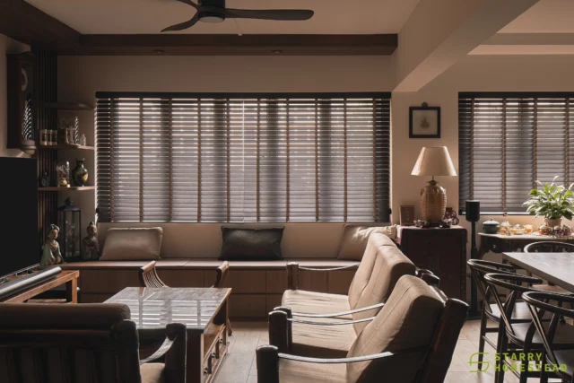 Rich wood tones frame this living space from ceiling to floor, creating a warm and grounded atmosphere. A display area and window seat bring both comfort and personality to the corner, while wooden shutters filter in soft daylight, giving the room a calm, timeless feel.
-
Bishan Street 22 // Modern Oriental
Designer: Callie
-
#starryhomestead #singapore #renovation #interiordesign #qanvast #homematch #hometrust #homedecor #interiors #interiorinspo #interiordesigninspo #renovationinspo #sginteriordesign #sgrenovation #interior #design #singaporehomes #sghome #hdb #bto #livingroom #modern #midcentury #oriental
