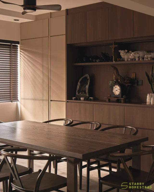 Beyond setting the overall aesthetic, space planning plays an equally important role in shaping a well-considered interior. 
A concealed storeroom is seamlessly integrated between the display cabinets, keeping the interior visually clean while making the most of every inch of available storage.
-
Bishan Street 22 // Modern Oriental
Designer: Callie
-
#starryhomestead #singapore #renovation #interiordesign #qanvast #homematch #hometrust #homedecor #interiors #interiorinspo #interiordesigninspo #renovationinspo #sginteriordesign #sgrenovation #interior #design #singaporehomes #sghome #hdb #bto #livingroom #midcentury #modern